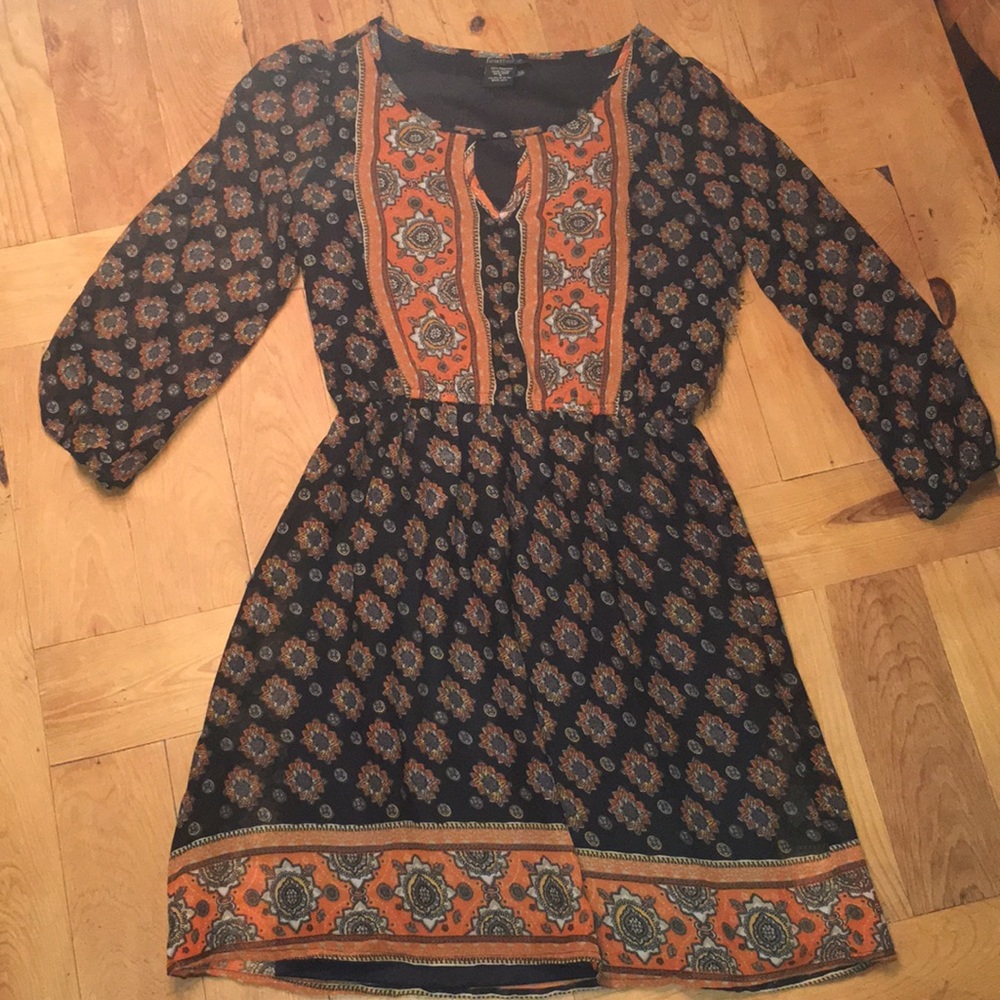 Super cute orange patterned fall dress!